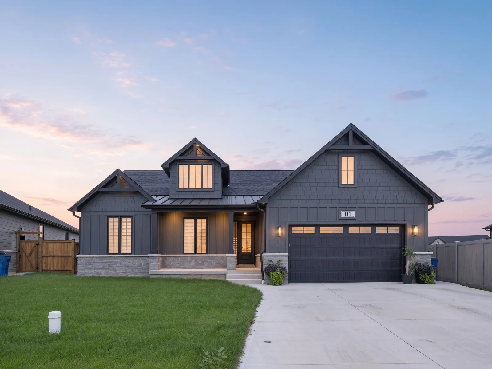 Front exterior of 111 Bloomington Way, Chatham, Ontario, a custom built ranch by Park Hill Custom Homes