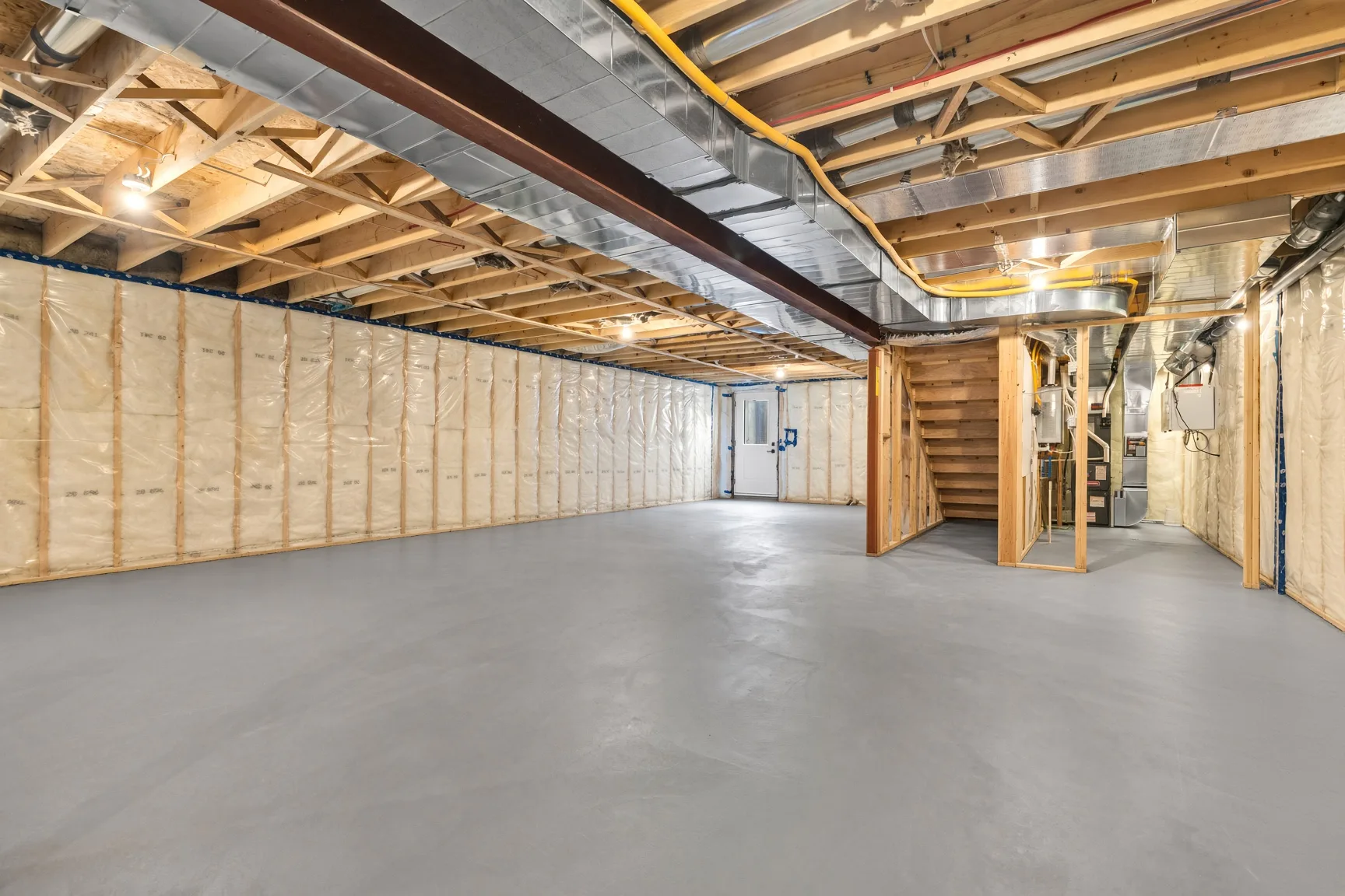 Framed and insulated basement with grade entrance